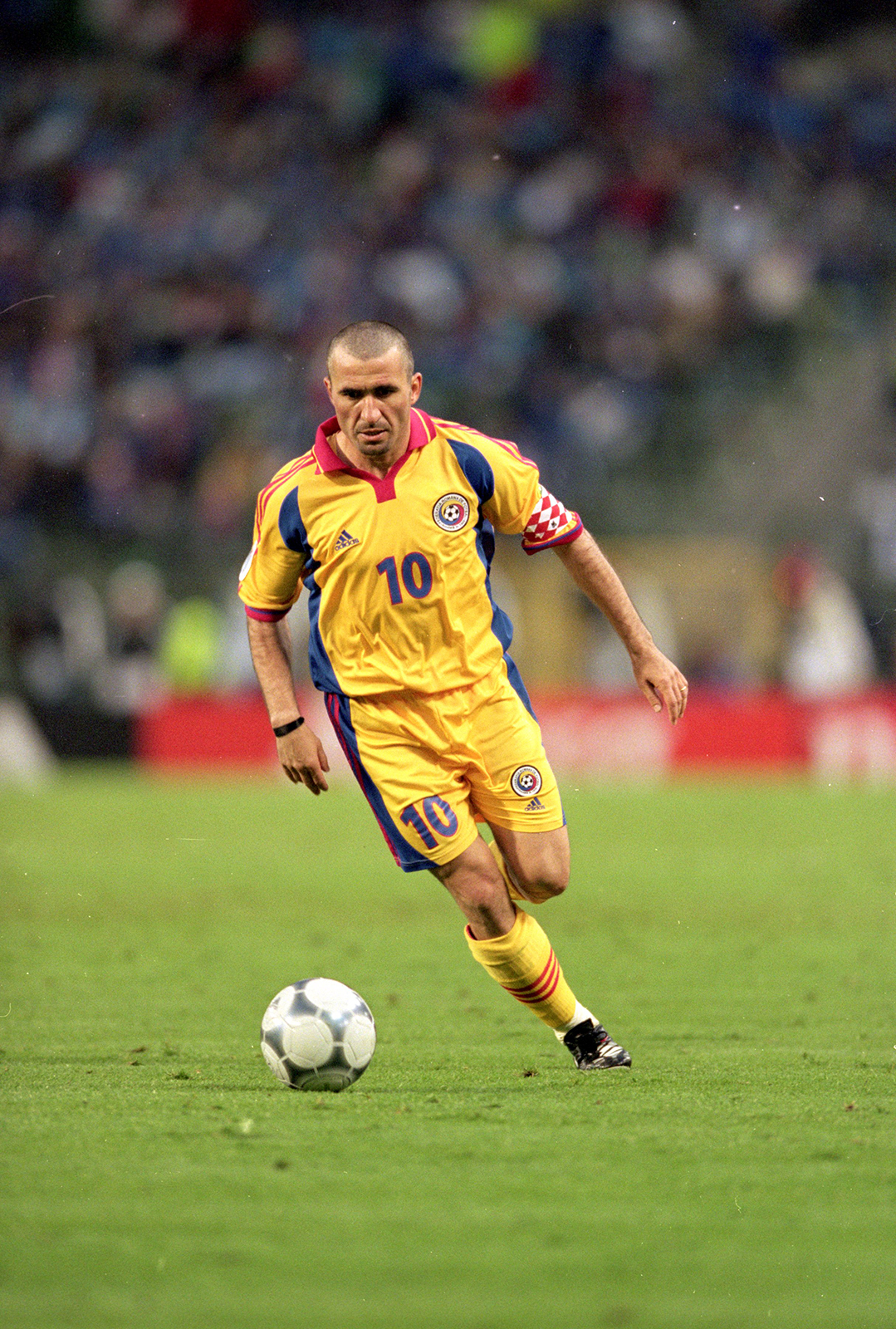 哈吉同为罗马尼亚国家队出场125次,打进35球.